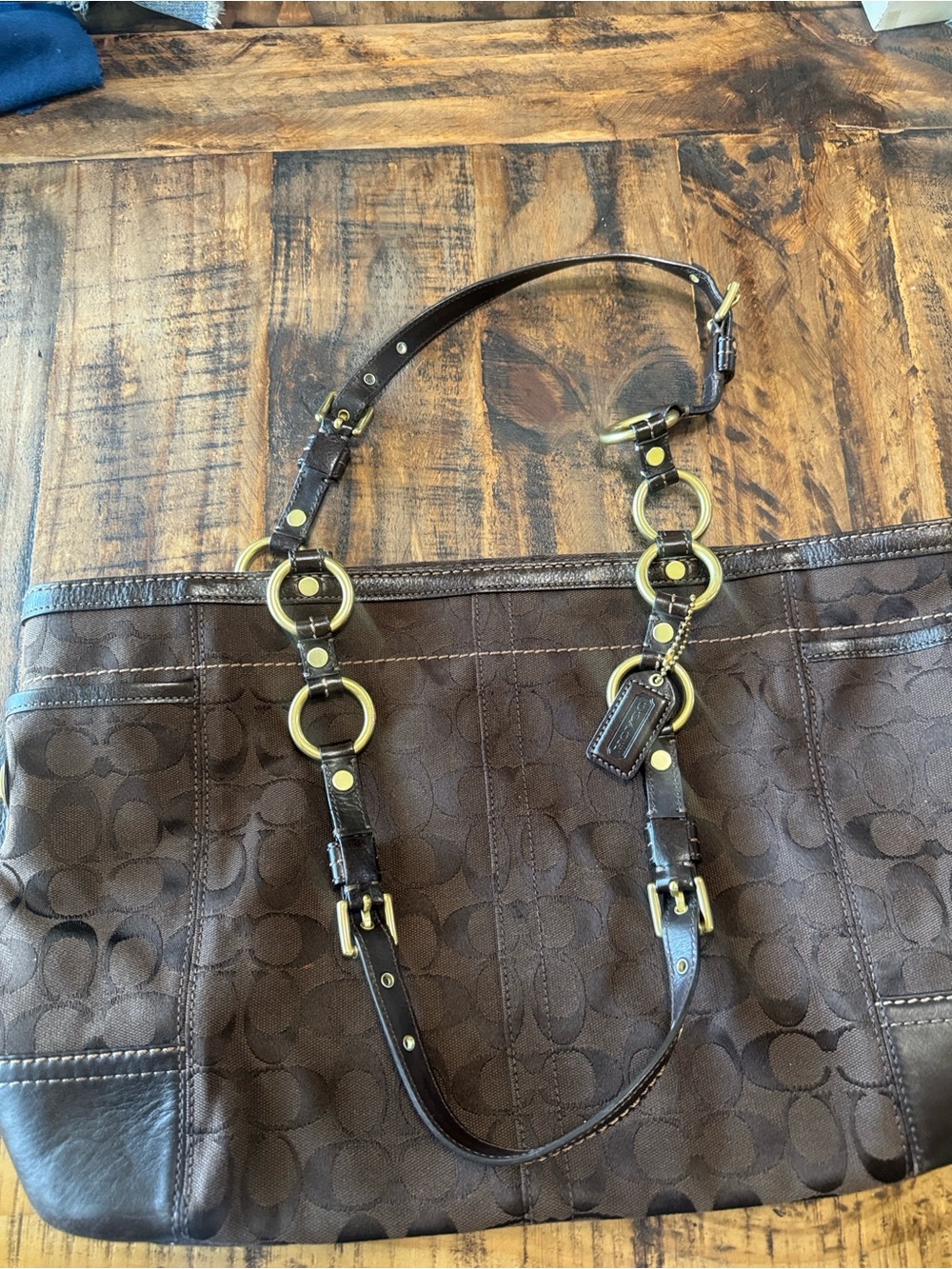 Coach Dark Brown Signature Canvas Shoulder Bag with Gold Rings